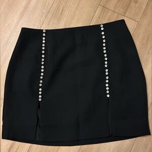 Skirt with rhinestones down the front
